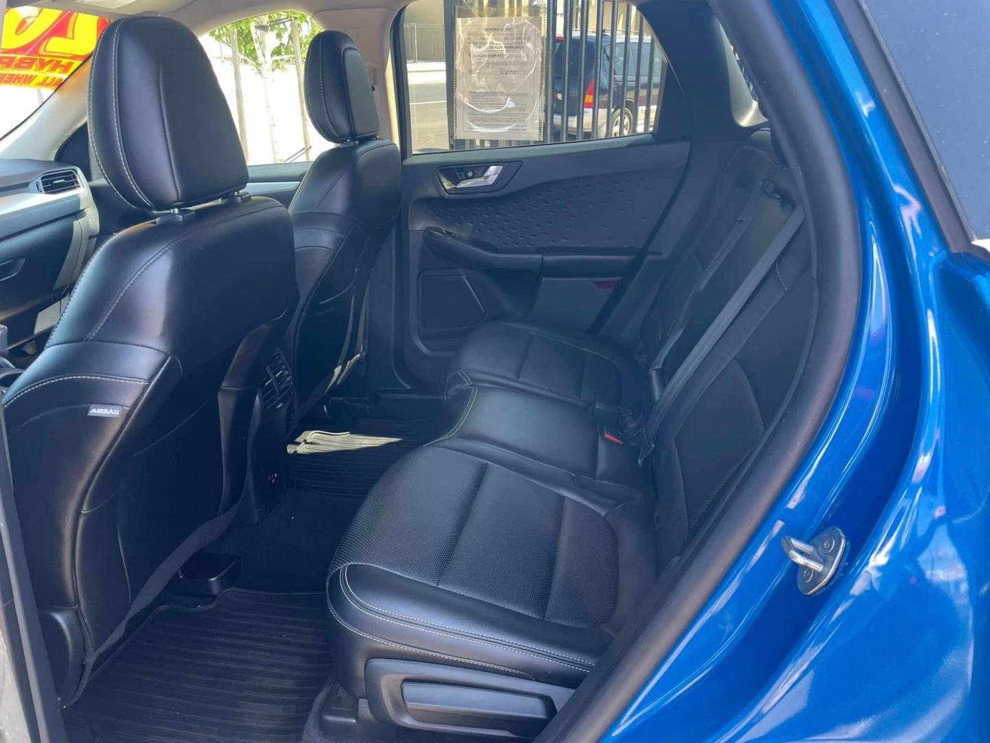 2020 Blue /BLACK Ford Escape Hybrid SE Sport AWD (1FMCU9BZ2LU) with an 2.5L L4 DOHC 16V HYBRID engine, 6A transmission, located at 744 E Miner Ave, Stockton, CA, 95202, (209) 944-5770, 37.956863, -121.282082 - PLUS TAXES AND FEES - Photo#5