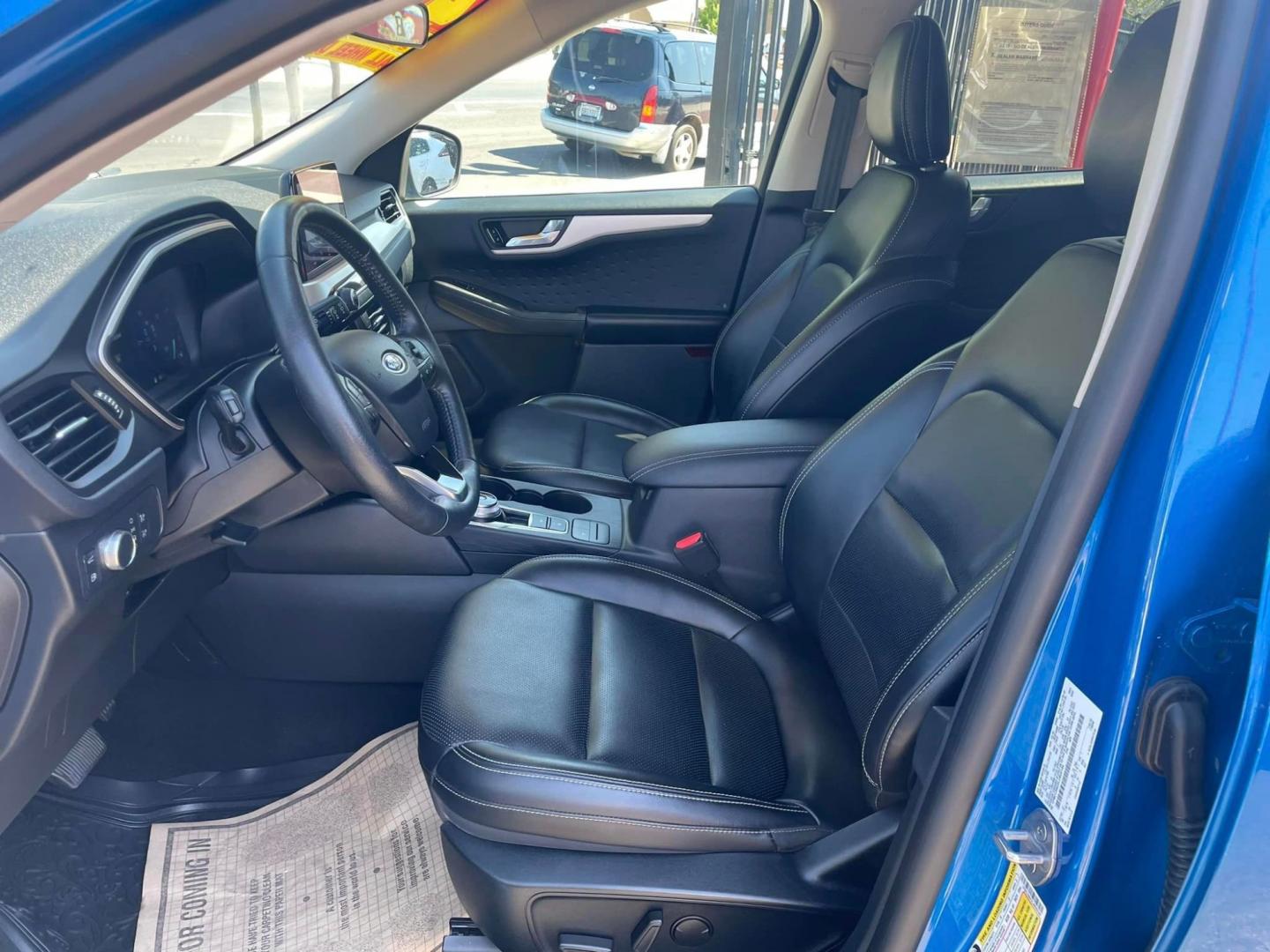 2020 Blue /BLACK Ford Escape Hybrid SE Sport AWD (1FMCU9BZ2LU) with an 2.5L L4 DOHC 16V HYBRID engine, 6A transmission, located at 744 E Miner Ave, Stockton, CA, 95202, (209) 944-5770, 37.956863, -121.282082 - PLUS TAXES AND FEES - Photo#4