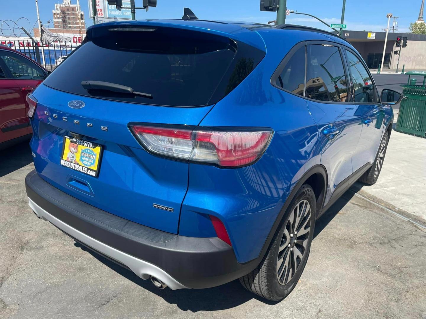 2020 Blue /BLACK Ford Escape Hybrid SE Sport AWD (1FMCU9BZ2LU) with an 2.5L L4 DOHC 16V HYBRID engine, 6A transmission, located at 744 E Miner Ave, Stockton, CA, 95202, (209) 944-5770, 37.956863, -121.282082 - PLUS TAXES AND FEES - Photo#7