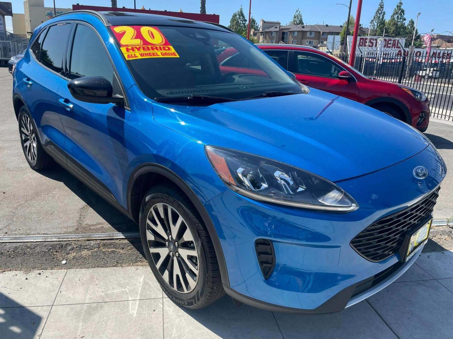 2020 Blue /BLACK Ford Escape Hybrid SE Sport AWD (1FMCU9BZ2LU) with an 2.5L L4 DOHC 16V HYBRID engine, 6A transmission, located at 744 E Miner Ave, Stockton, CA, 95202, (209) 944-5770, 37.956863, -121.282082 - PLUS TAXES AND FEES - Photo#0