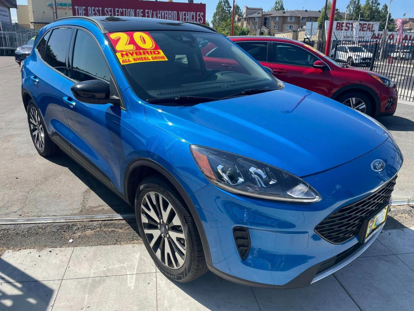 2020 Blue /BLACK Ford Escape Hybrid SE Sport AWD (1FMCU9BZ2LU) with an 2.5L L4 DOHC 16V HYBRID engine, 6A transmission, located at 744 E Miner Ave, Stockton, CA, 95202, (209) 944-5770, 37.956863, -121.282082 - PLUS TAXES AND FEES - Photo#1