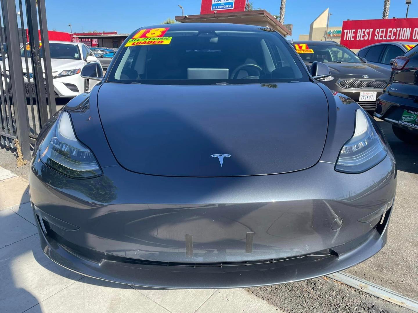 2018 GRAY /Black Tesla Model 3 Long Range Sedan 4D (5YJ3E1EA2JF) with an ELECTRIC engine, 1A transmission, located at 744 E Miner Ave, Stockton, CA, 95202, (209) 944-5770, 37.956863, -121.282082 - Photo#2