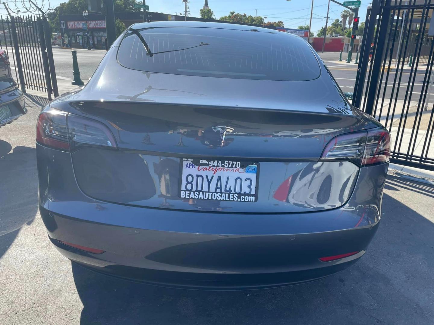 2018 GRAY /Black Tesla Model 3 Long Range Sedan 4D (5YJ3E1EA2JF) with an ELECTRIC engine, 1A transmission, located at 744 E Miner Ave, Stockton, CA, 95202, (209) 944-5770, 37.956863, -121.282082 - Photo#5