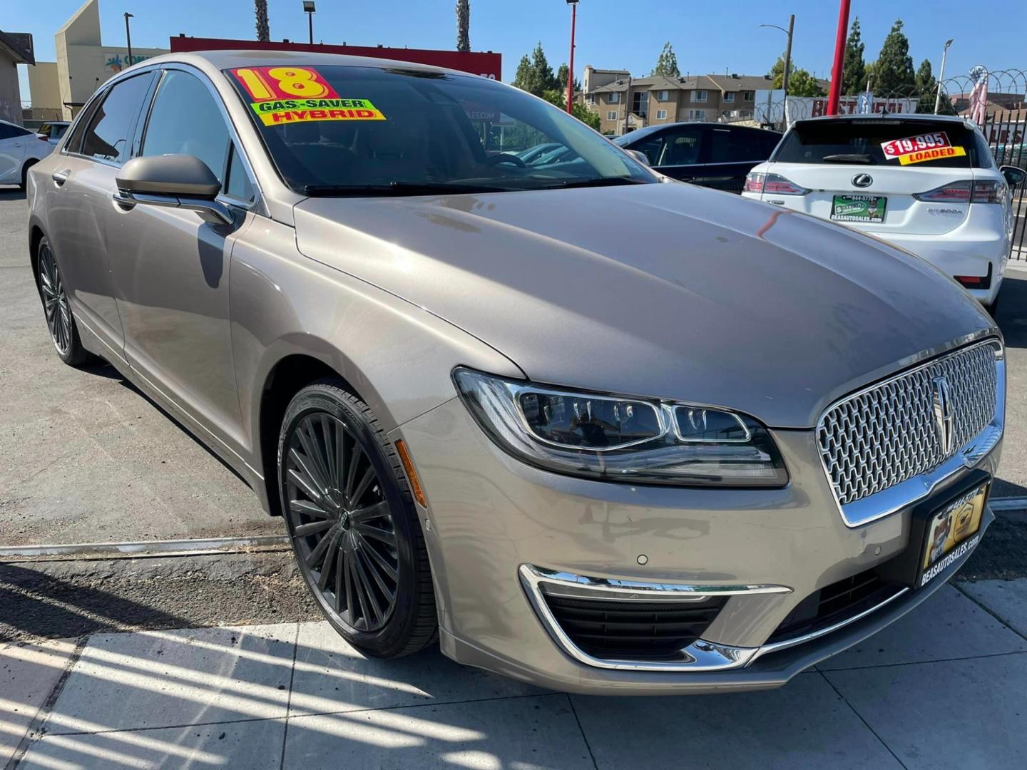 2018 ICED MOCHA /Tan Lincoln MKZ Hybrid Reserve (3LN6L5MU0JR) with an 2.0L L4 DOHC 16V HYBRID engine, CVT transmission, located at 744 E Miner Ave, Stockton, CA, 95202, (209) 944-5770, 37.956863, -121.282082 - Photo#0