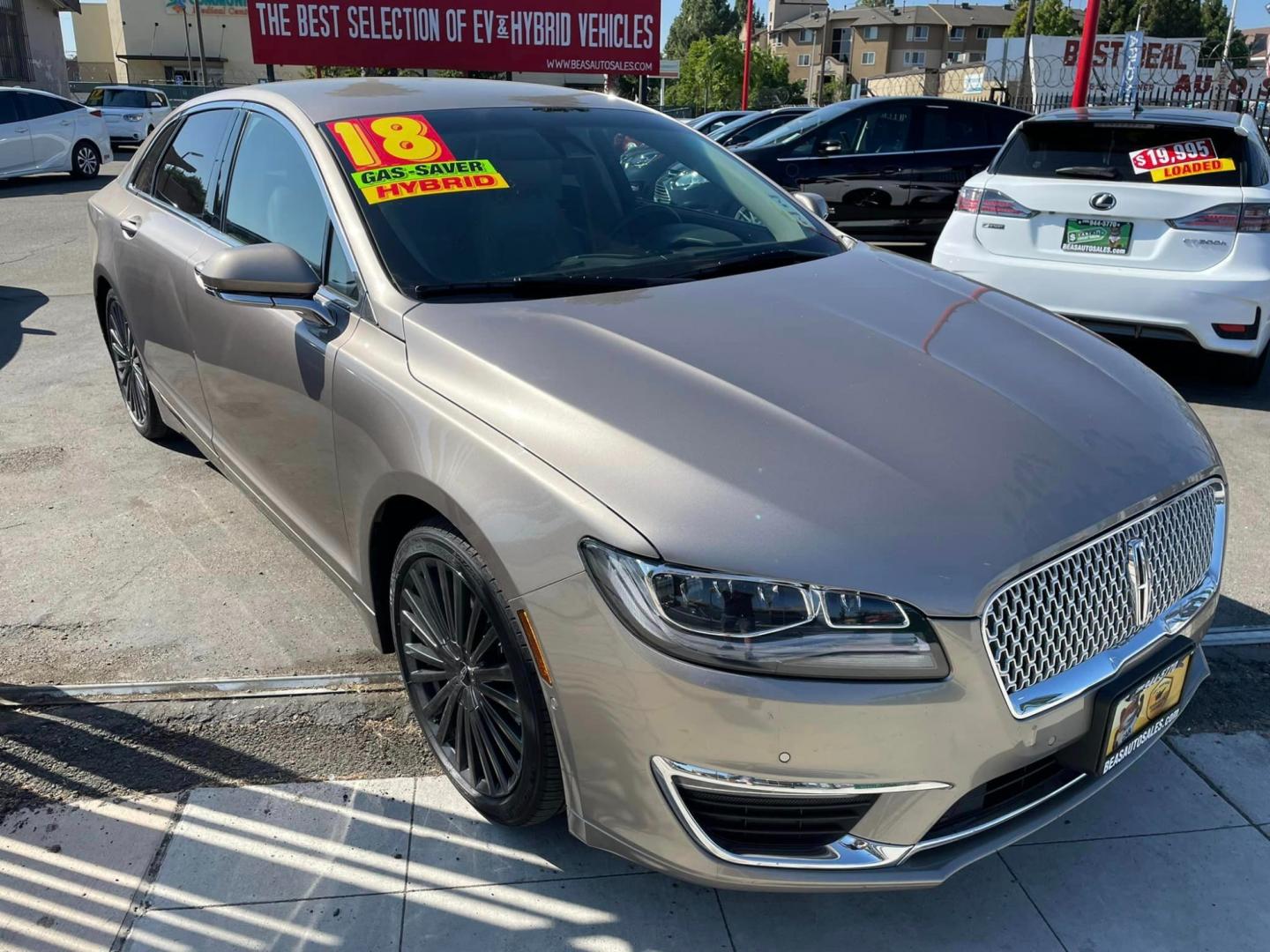 2018 ICED MOCHA /Tan Lincoln MKZ Hybrid Reserve (3LN6L5MU0JR) with an 2.0L L4 DOHC 16V HYBRID engine, CVT transmission, located at 744 E Miner Ave, Stockton, CA, 95202, (209) 944-5770, 37.956863, -121.282082 - Photo#1