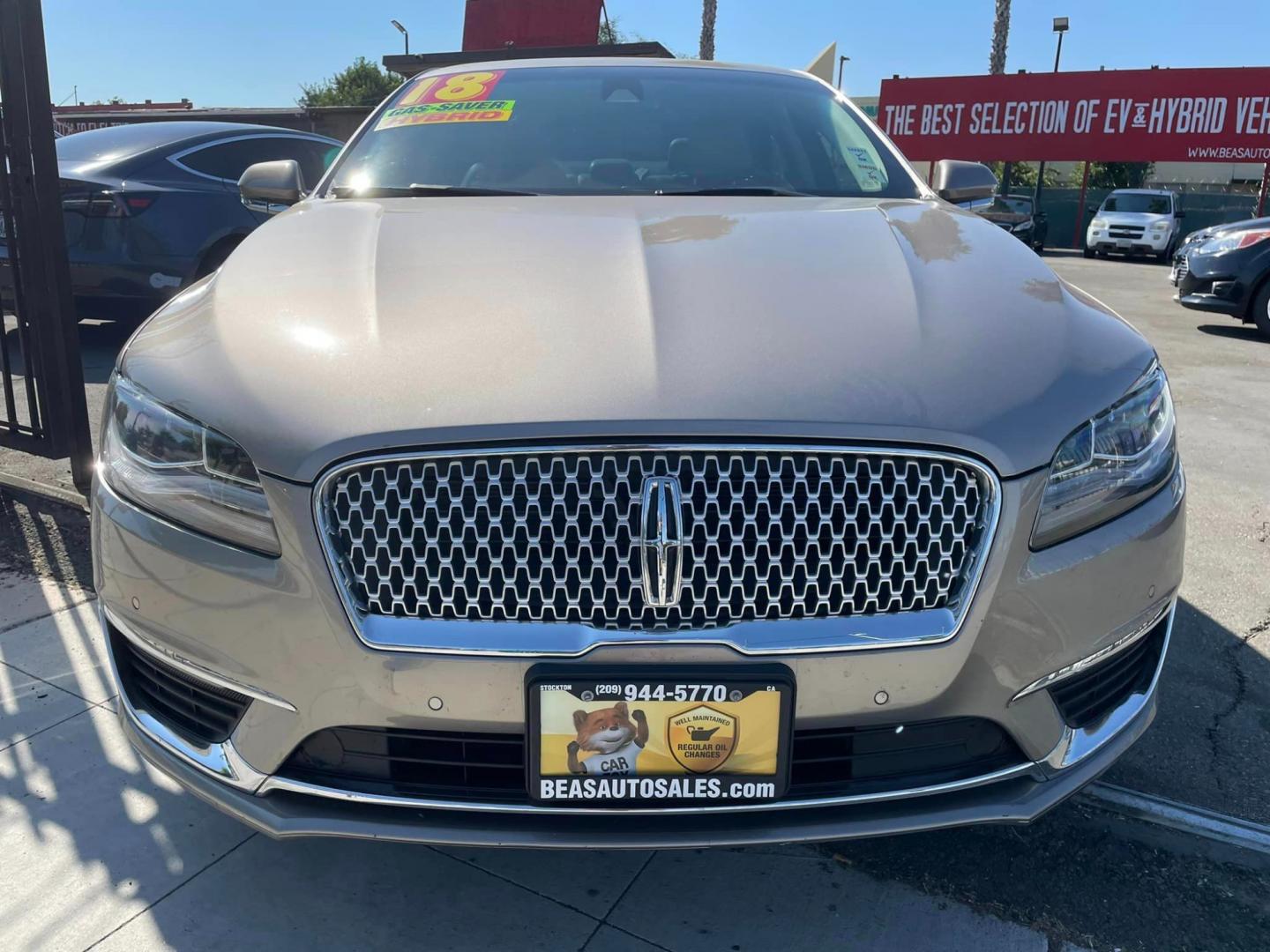 2018 ICED MOCHA /Tan Lincoln MKZ Hybrid Reserve (3LN6L5MU0JR) with an 2.0L L4 DOHC 16V HYBRID engine, CVT transmission, located at 744 E Miner Ave, Stockton, CA, 95202, (209) 944-5770, 37.956863, -121.282082 - Photo#2