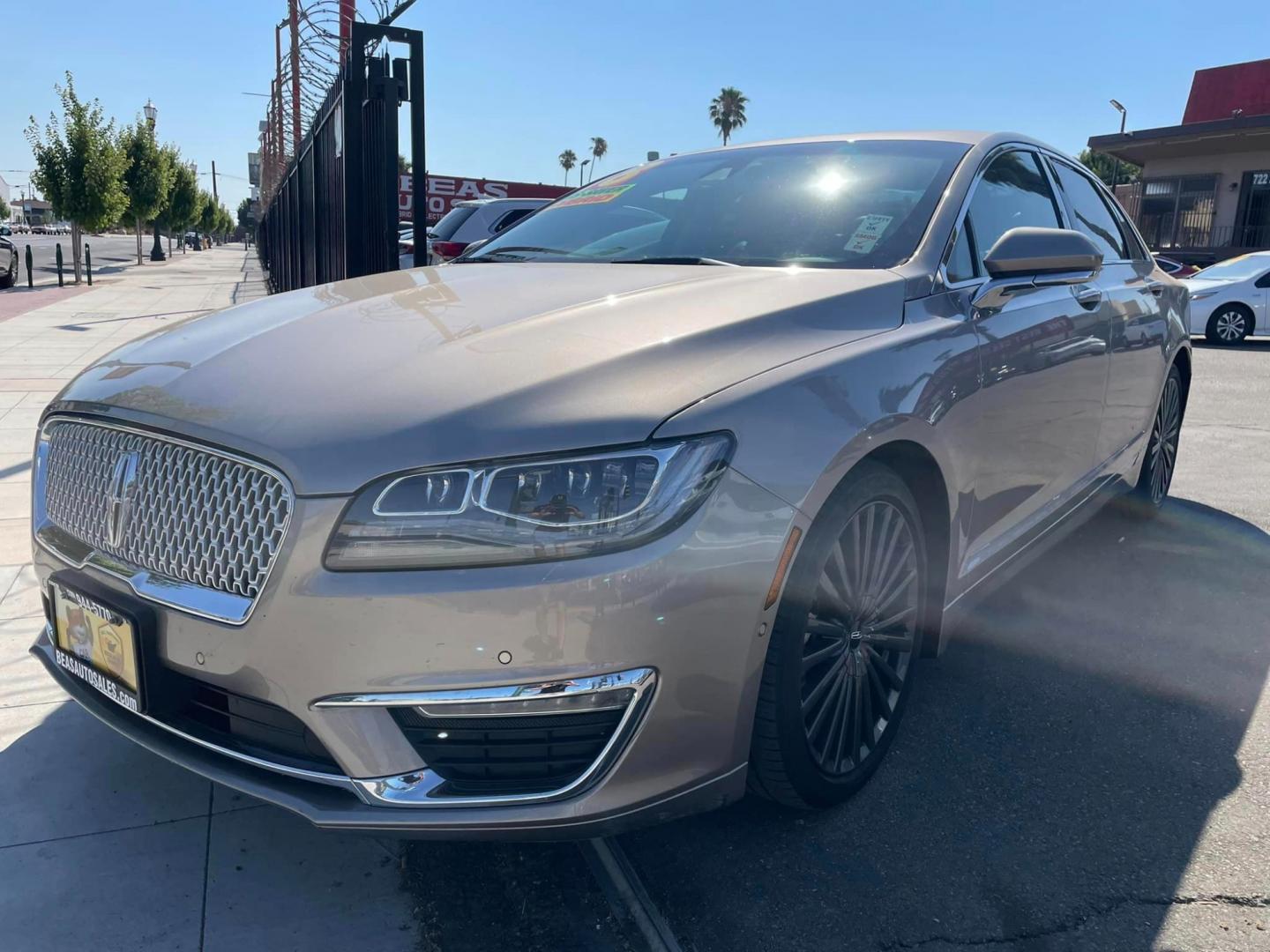 2018 ICED MOCHA /Tan Lincoln MKZ Hybrid Reserve (3LN6L5MU0JR) with an 2.0L L4 DOHC 16V HYBRID engine, CVT transmission, located at 744 E Miner Ave, Stockton, CA, 95202, (209) 944-5770, 37.956863, -121.282082 - Photo#3