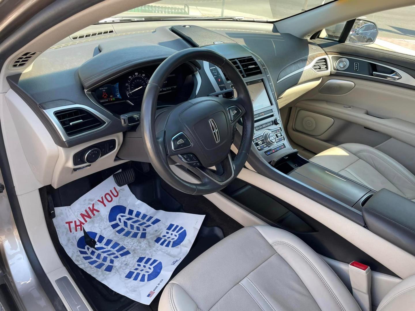 2018 ICED MOCHA /Tan Lincoln MKZ Hybrid Reserve (3LN6L5MU0JR) with an 2.0L L4 DOHC 16V HYBRID engine, CVT transmission, located at 744 E Miner Ave, Stockton, CA, 95202, (209) 944-5770, 37.956863, -121.282082 - Photo#8