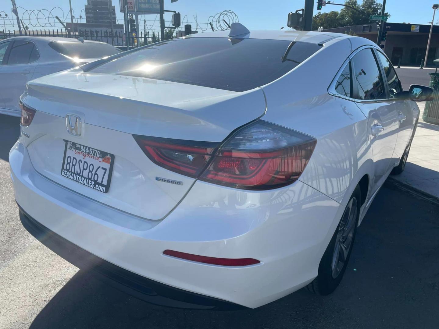 2020 WHITE /BLACK Honda Insight EX (19XZE4F54LE) with an 1.5L L4 DOHC 16V engine, CVT transmission, located at 744 E Miner Ave, Stockton, CA, 95202, (209) 944-5770, 37.956863, -121.282082 - PLUS TAXES AND FEES - Photo#12