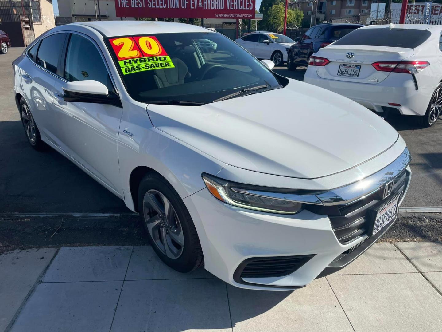 2020 WHITE /BLACK Honda Insight EX (19XZE4F54LE) with an 1.5L L4 DOHC 16V engine, CVT transmission, located at 744 E Miner Ave, Stockton, CA, 95202, (209) 944-5770, 37.956863, -121.282082 - PLUS TAXES AND FEES - Photo#1