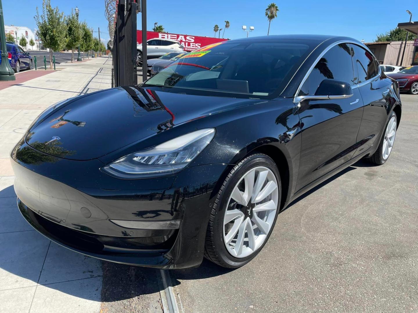 2019 BLACK /BLACK Tesla Model 3 Base (5YJ3E1EA4KF) with an ELECTRIC engine, 1A transmission, located at 744 E Miner Ave, Stockton, CA, 95202, (209) 944-5770, 37.956863, -121.282082 - PLUS TAXES AND FEES - Photo#2