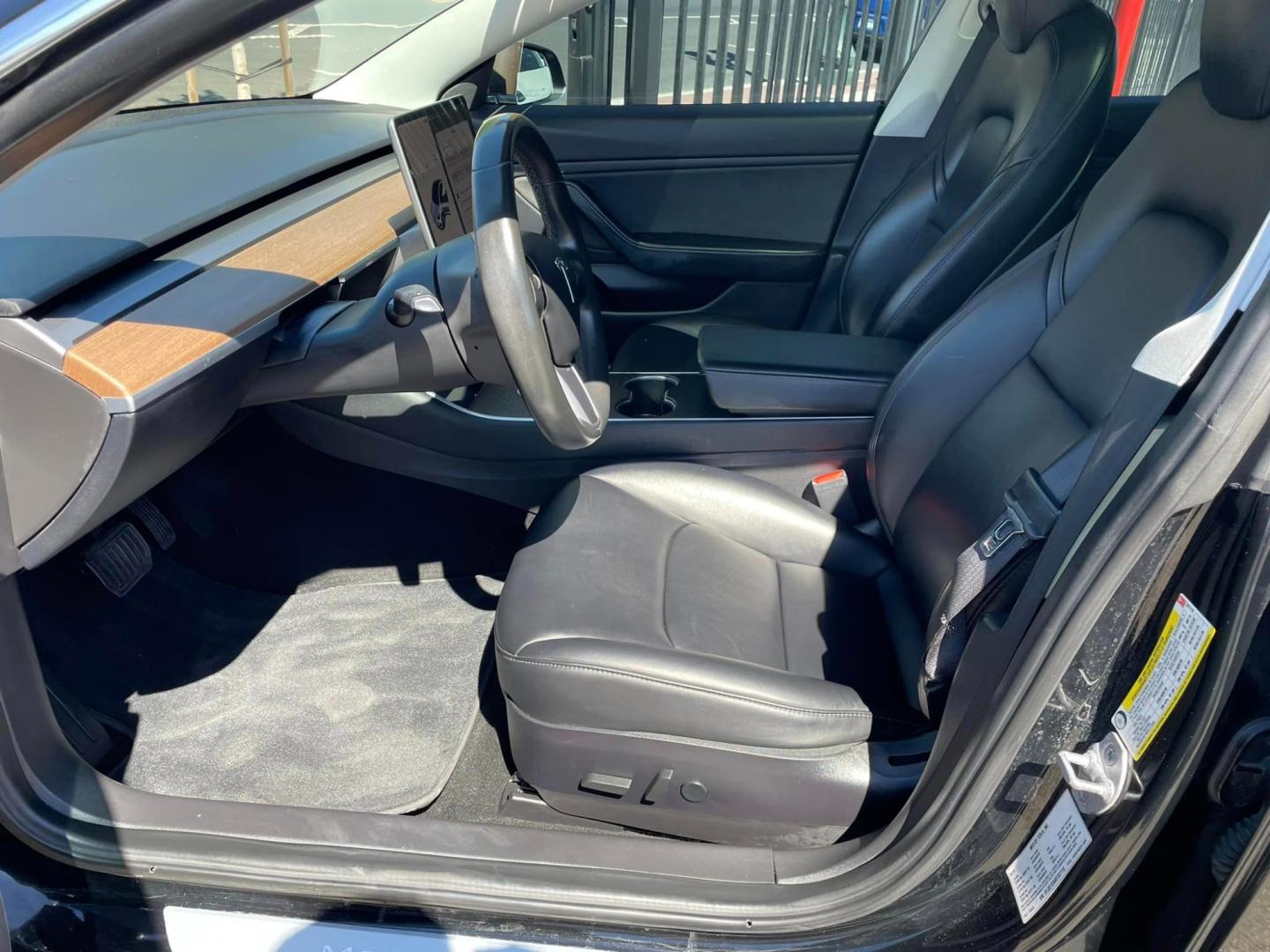 2019 BLACK /BLACK Tesla Model 3 Base (5YJ3E1EA4KF) with an ELECTRIC engine, 1A transmission, located at 744 E Miner Ave, Stockton, CA, 95202, (209) 944-5770, 37.956863, -121.282082 - PLUS TAXES AND FEES - Photo#4