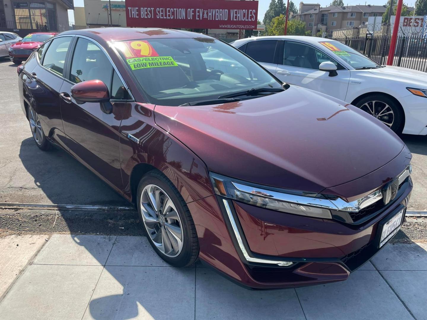 2019 Burgundy Honda Clarity Touring Plug-In Hybrid (JHMZC5F37KC) with an 1.5L L4 DOHC 16V HYBRID engine, CVT transmission, located at 744 E Miner Ave, Stockton, CA, 95202, (209) 944-5770, 37.956863, -121.282082 - PLUS TAXES AND FEES - Photo#1