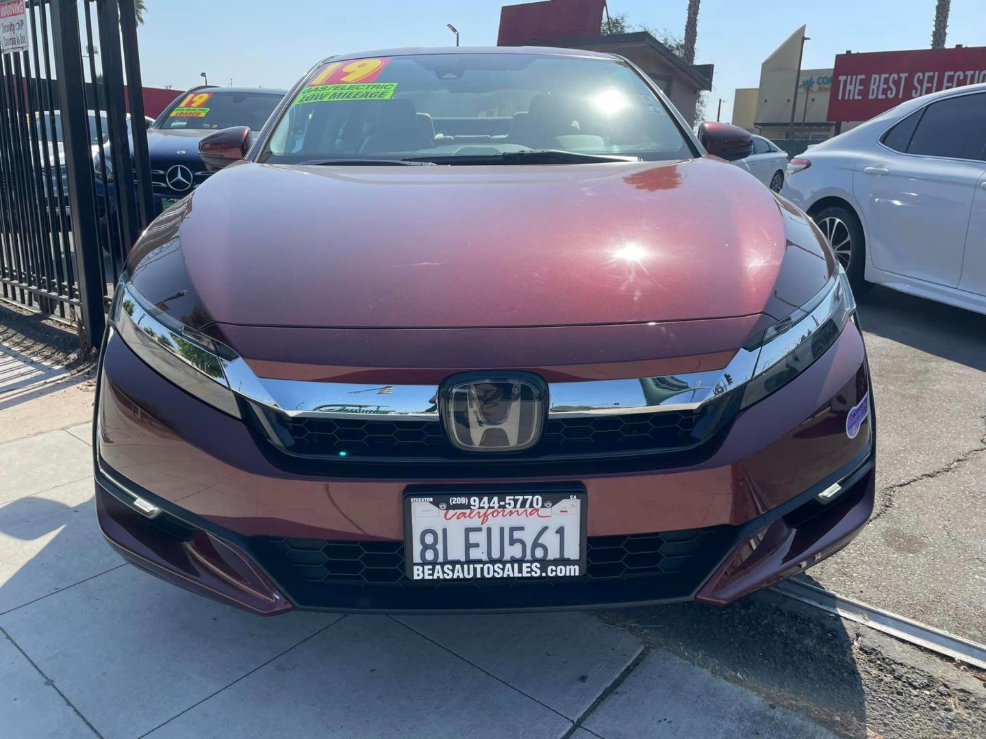 2019 Burgundy Honda Clarity Touring Plug-In Hybrid (JHMZC5F37KC) with an 1.5L L4 DOHC 16V HYBRID engine, CVT transmission, located at 744 E Miner Ave, Stockton, CA, 95202, (209) 944-5770, 37.956863, -121.282082 - PLUS TAXES AND FEES - Photo#2