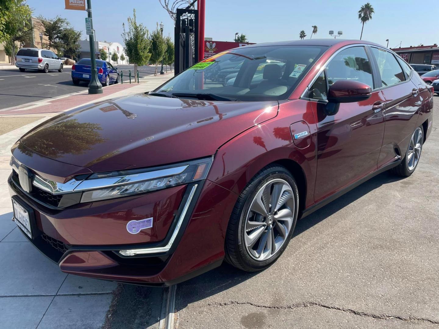 2019 Burgundy Honda Clarity Touring Plug-In Hybrid (JHMZC5F37KC) with an 1.5L L4 DOHC 16V HYBRID engine, CVT transmission, located at 744 E Miner Ave, Stockton, CA, 95202, (209) 944-5770, 37.956863, -121.282082 - PLUS TAXES AND FEES - Photo#3