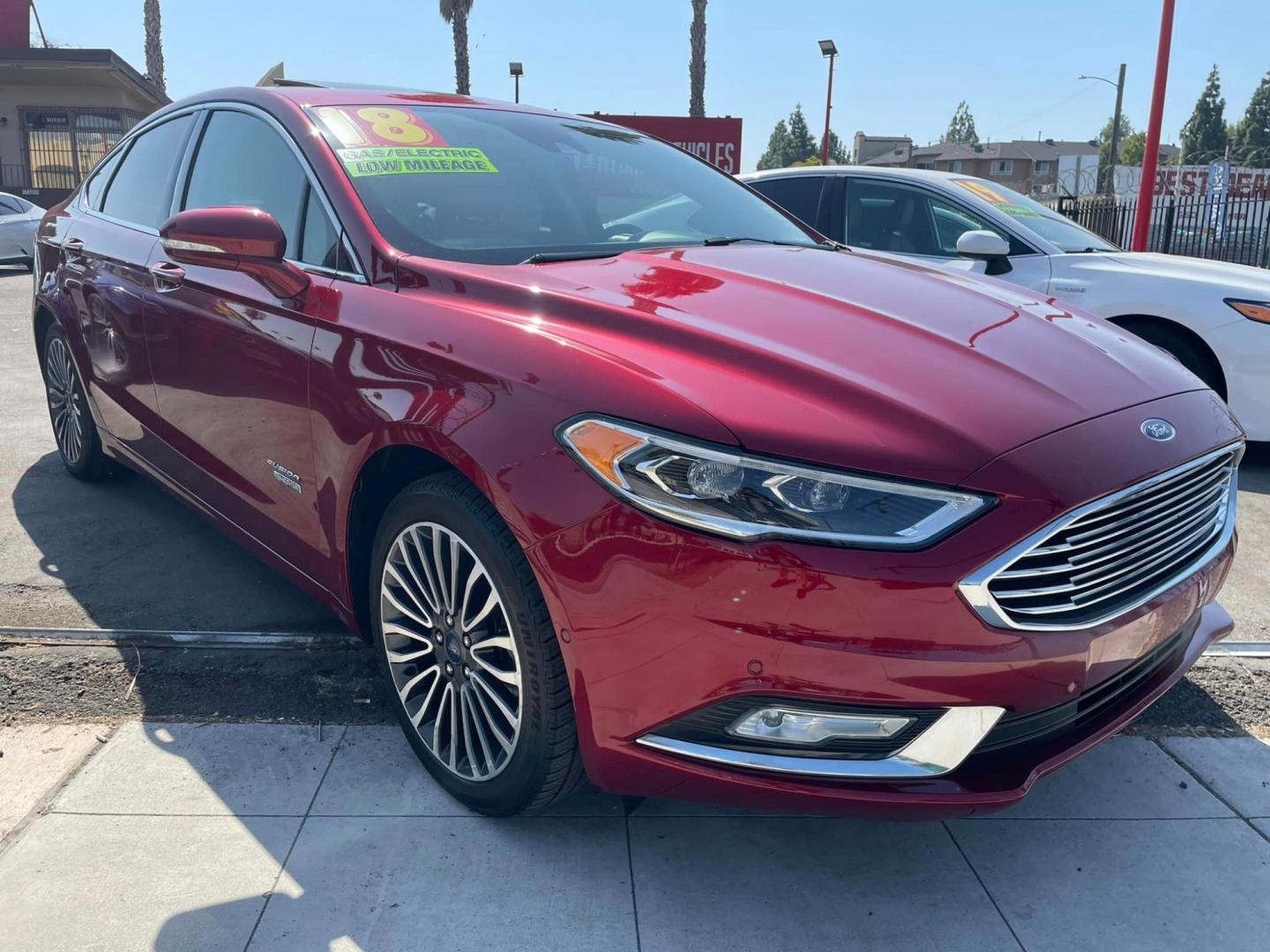 2018 RED /GRAY Ford Fusion Energi Titanium (3FA6P0SUXJR) with an 2.0L L4 DOHC 16V HYBRID engine, CVT transmission, located at 744 E Miner Ave, Stockton, CA, 95202, (209) 944-5770, 37.956863, -121.282082 - Photo#0