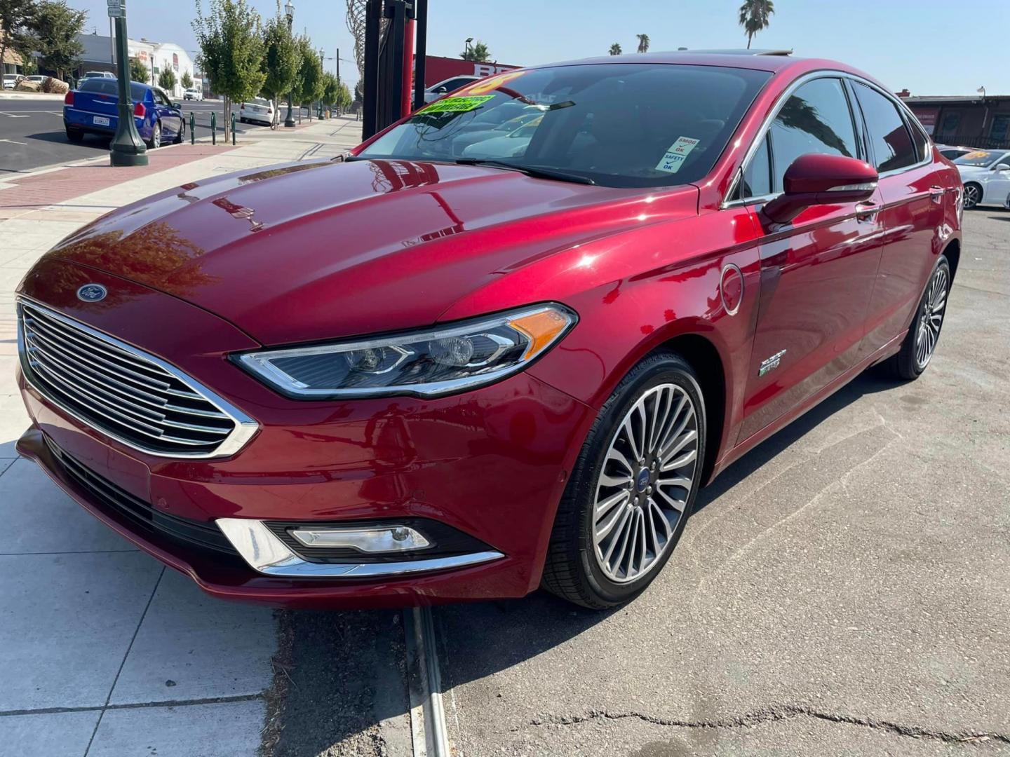 2018 RED /GRAY Ford Fusion Energi Titanium (3FA6P0SUXJR) with an 2.0L L4 DOHC 16V HYBRID engine, CVT transmission, located at 744 E Miner Ave, Stockton, CA, 95202, (209) 944-5770, 37.956863, -121.282082 - Photo#3