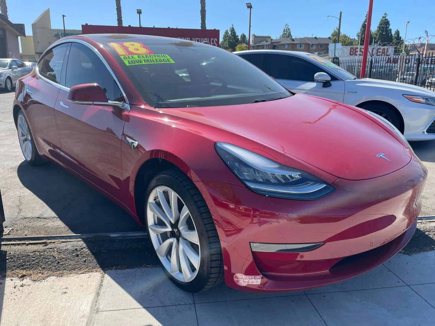 2018 RED /BLACK Tesla Model 3 Base (5YJ3E1EA9JF) with an ELECTRIC engine, 1A transmission, located at 744 E Miner Ave, Stockton, CA, 95202, (209) 944-5770, 37.956863, -121.282082 - Photo#0