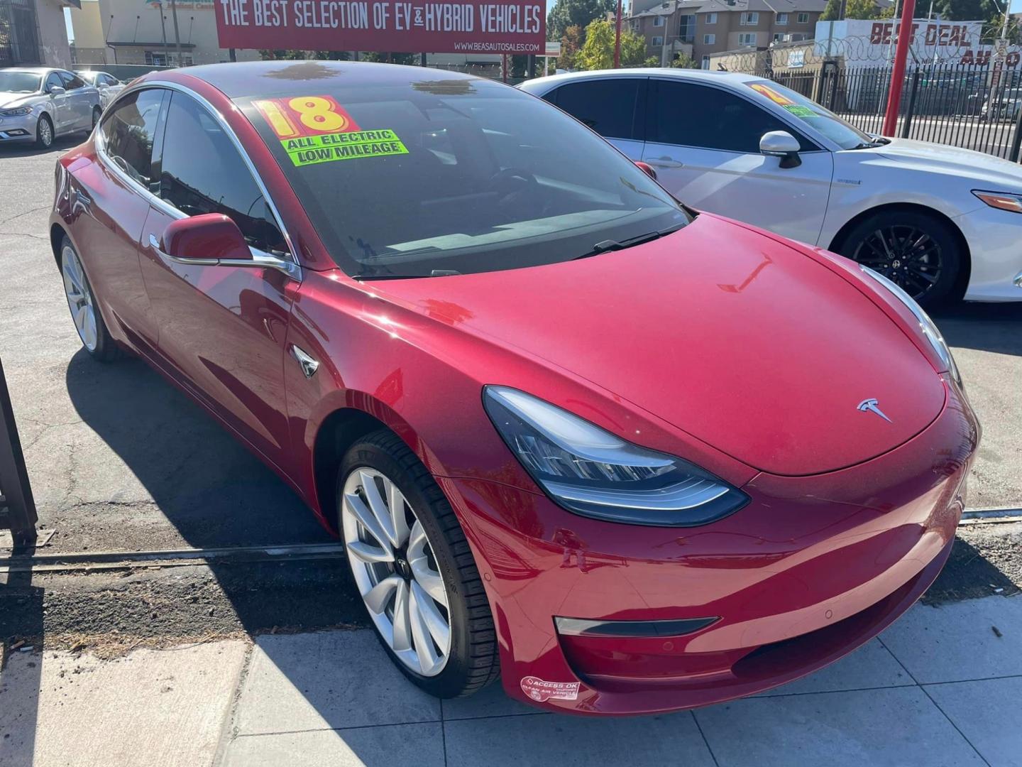 2018 RED /BLACK Tesla Model 3 Base (5YJ3E1EA9JF) with an ELECTRIC engine, 1A transmission, located at 744 E Miner Ave, Stockton, CA, 95202, (209) 944-5770, 37.956863, -121.282082 - Photo#1