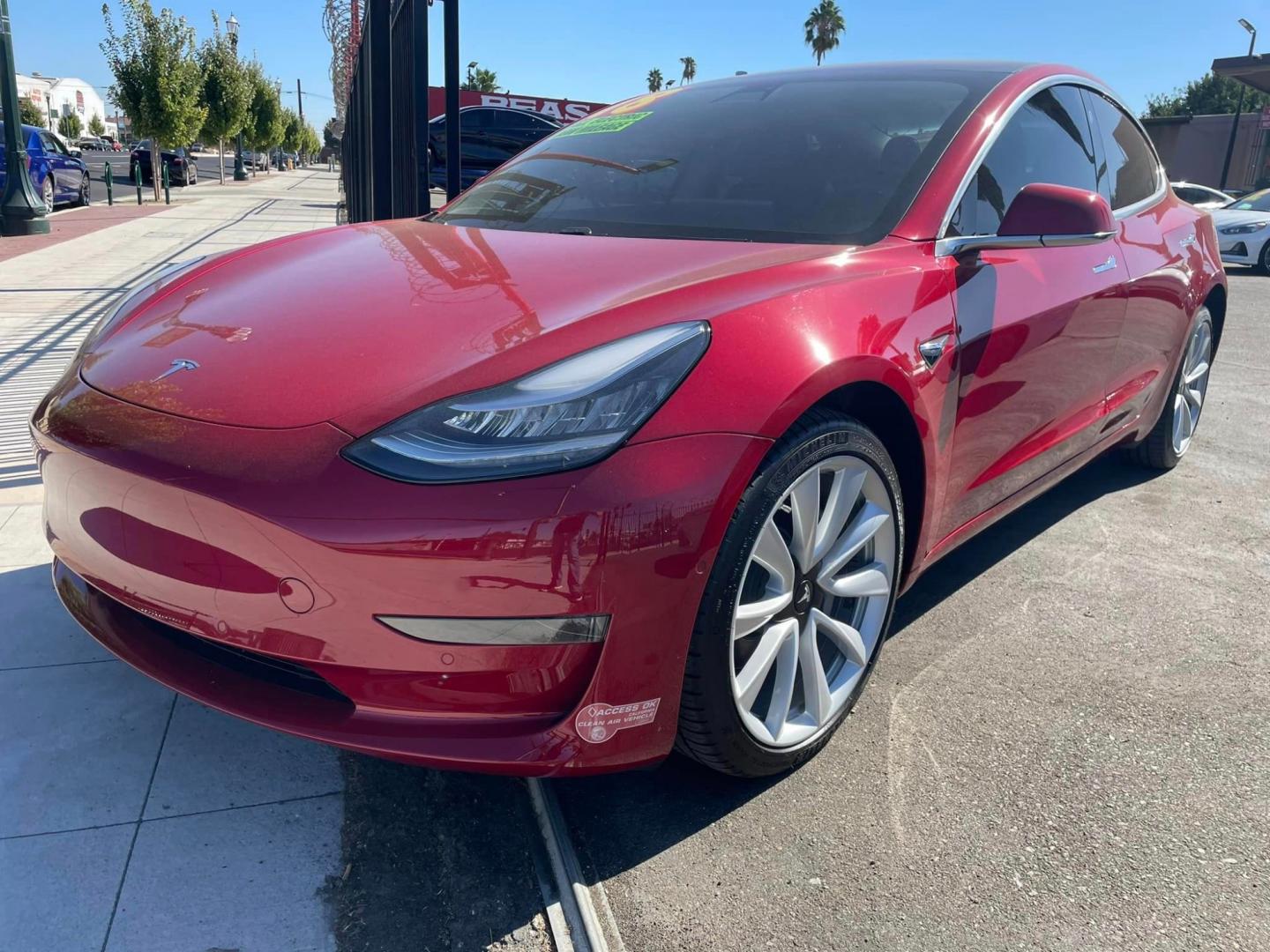 2018 RED /BLACK Tesla Model 3 Base (5YJ3E1EA9JF) with an ELECTRIC engine, 1A transmission, located at 744 E Miner Ave, Stockton, CA, 95202, (209) 944-5770, 37.956863, -121.282082 - Photo#3