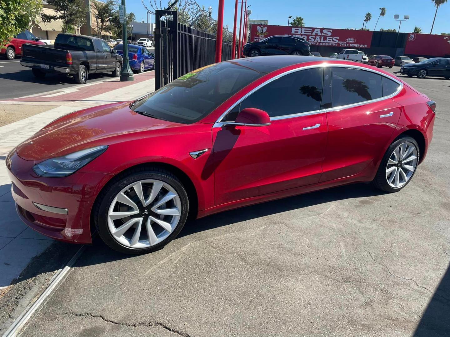 2018 RED /BLACK Tesla Model 3 Base (5YJ3E1EA9JF) with an ELECTRIC engine, 1A transmission, located at 744 E Miner Ave, Stockton, CA, 95202, (209) 944-5770, 37.956863, -121.282082 - Photo#4