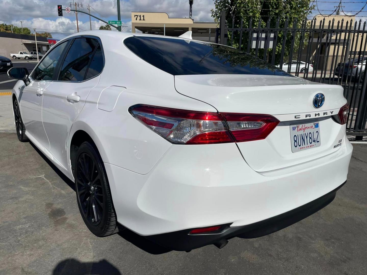 2020 WHITE /BLACK Toyota Camry Hybrid LE (4T1C31AK9LU) with an 2.5L L4 DOHC 16V HYBRID engine, CVT transmission, located at 744 E Miner Ave, Stockton, CA, 95202, (209) 944-5770, 37.956863, -121.282082 - PLUS TAXES AND FEES - Photo#11