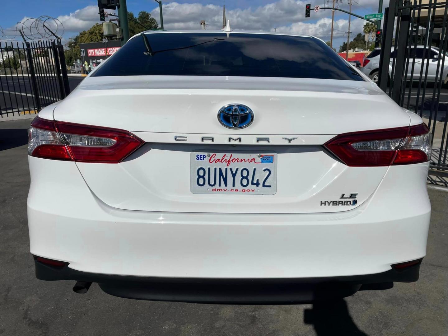 2020 WHITE /BLACK Toyota Camry Hybrid LE (4T1C31AK9LU) with an 2.5L L4 DOHC 16V HYBRID engine, CVT transmission, located at 744 E Miner Ave, Stockton, CA, 95202, (209) 944-5770, 37.956863, -121.282082 - PLUS TAXES AND FEES - Photo#12