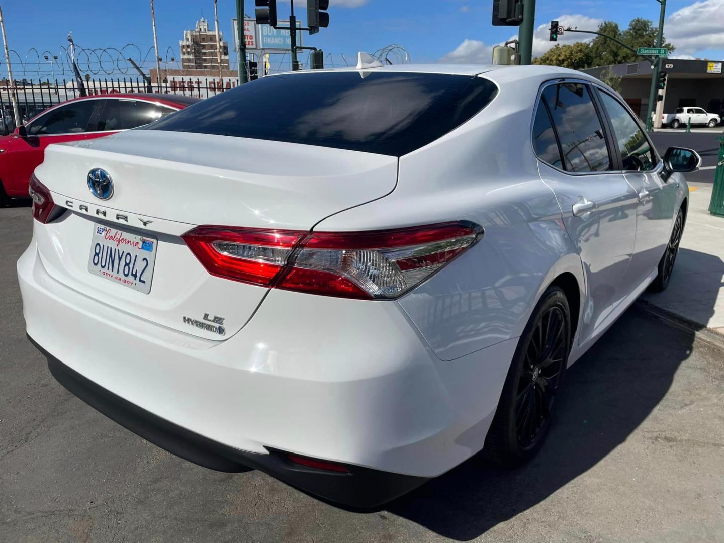 2020 WHITE /BLACK Toyota Camry Hybrid LE (4T1C31AK9LU) with an 2.5L L4 DOHC 16V HYBRID engine, CVT transmission, located at 744 E Miner Ave, Stockton, CA, 95202, (209) 944-5770, 37.956863, -121.282082 - PLUS TAXES AND FEES - Photo#13