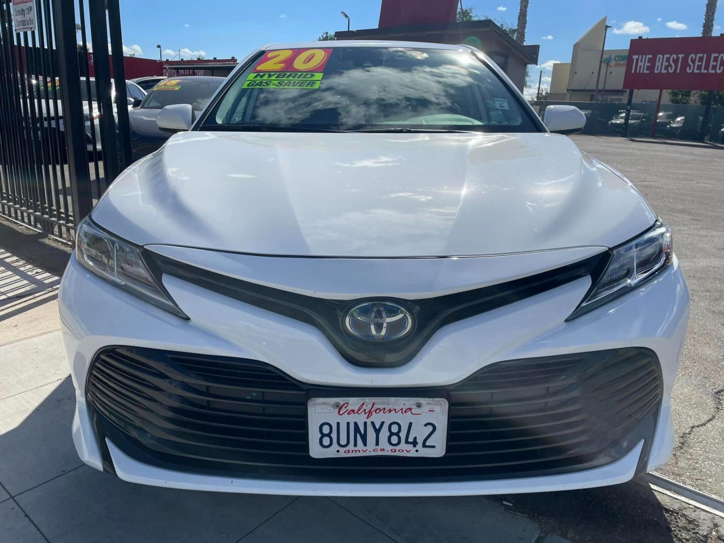 2020 WHITE /BLACK Toyota Camry Hybrid LE (4T1C31AK9LU) with an 2.5L L4 DOHC 16V HYBRID engine, CVT transmission, located at 744 E Miner Ave, Stockton, CA, 95202, (209) 944-5770, 37.956863, -121.282082 - PLUS TAXES AND FEES - Photo#2