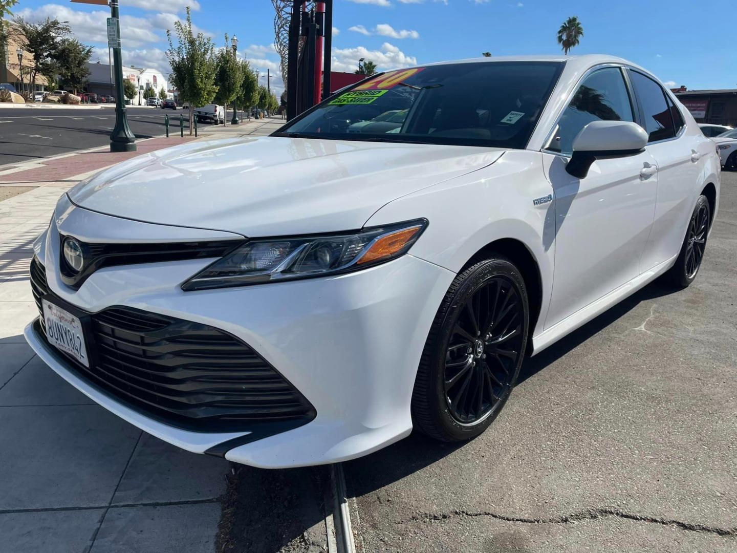 2020 WHITE /BLACK Toyota Camry Hybrid LE (4T1C31AK9LU) with an 2.5L L4 DOHC 16V HYBRID engine, CVT transmission, located at 744 E Miner Ave, Stockton, CA, 95202, (209) 944-5770, 37.956863, -121.282082 - PLUS TAXES AND FEES - Photo#3