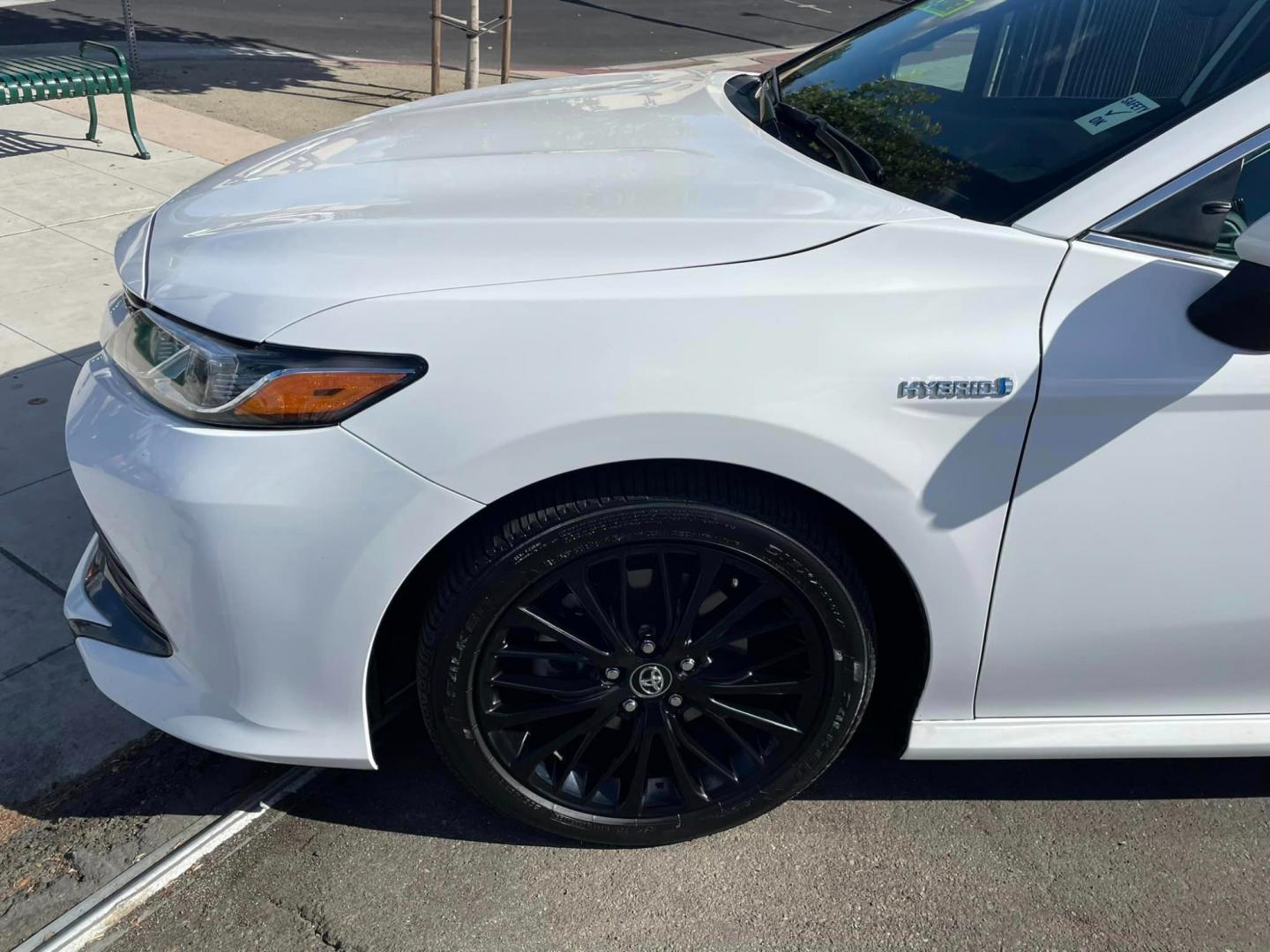 2020 WHITE /BLACK Toyota Camry Hybrid LE (4T1C31AK9LU) with an 2.5L L4 DOHC 16V HYBRID engine, CVT transmission, located at 744 E Miner Ave, Stockton, CA, 95202, (209) 944-5770, 37.956863, -121.282082 - PLUS TAXES AND FEES - Photo#4