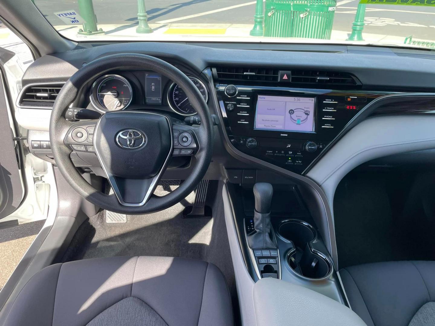 2020 WHITE /BLACK Toyota Camry Hybrid LE (4T1C31AK9LU) with an 2.5L L4 DOHC 16V HYBRID engine, CVT transmission, located at 744 E Miner Ave, Stockton, CA, 95202, (209) 944-5770, 37.956863, -121.282082 - PLUS TAXES AND FEES - Photo#7