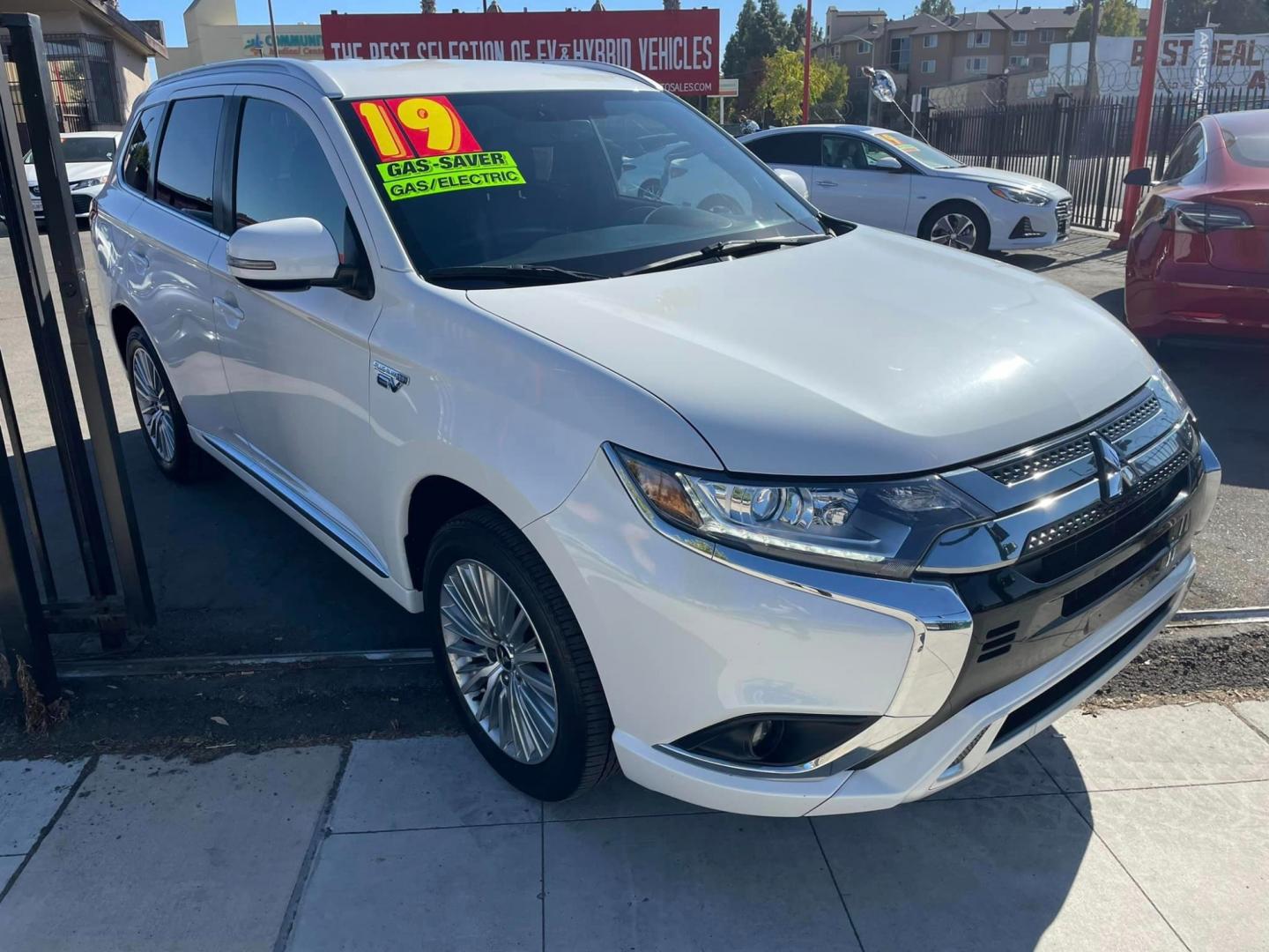 2019 WHITE /BLACK Mitsubishi Outlander PHEV SEL (JA4J24A57KZ) with an 2.0L L4 DOHC 16V HYBRID engine, 1A transmission, located at 744 E Miner Ave, Stockton, CA, 95202, (209) 944-5770, 37.956863, -121.282082 - Photo#1