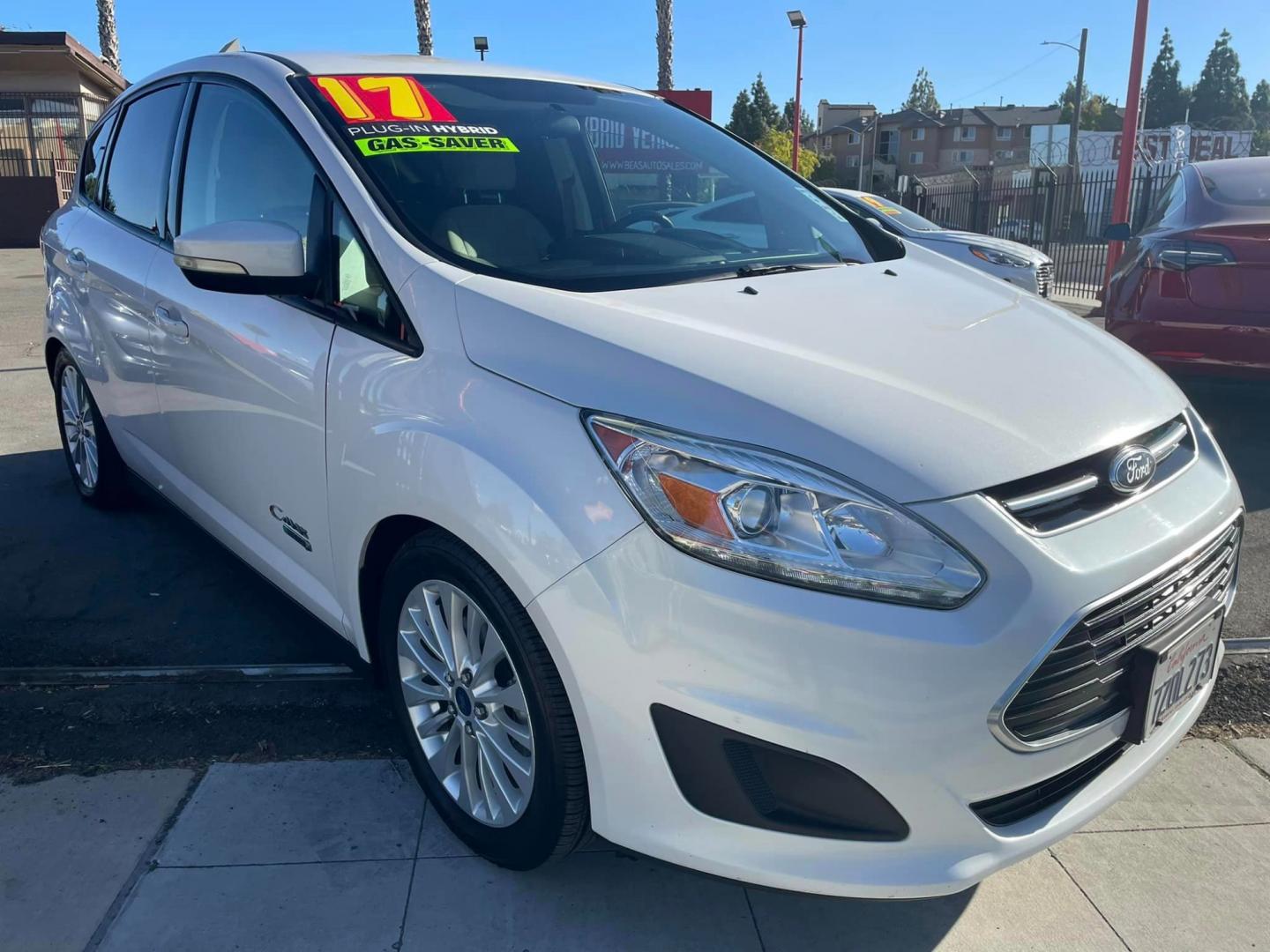 2017 WHITE Ford C-Max Energi SE (1FADP5EU7HL) with an 2.0L L4 DOHC 16V HYBRID engine, CVT transmission, located at 744 E Miner Ave, Stockton, CA, 95202, (209) 944-5770, 37.956863, -121.282082 - Photo#0