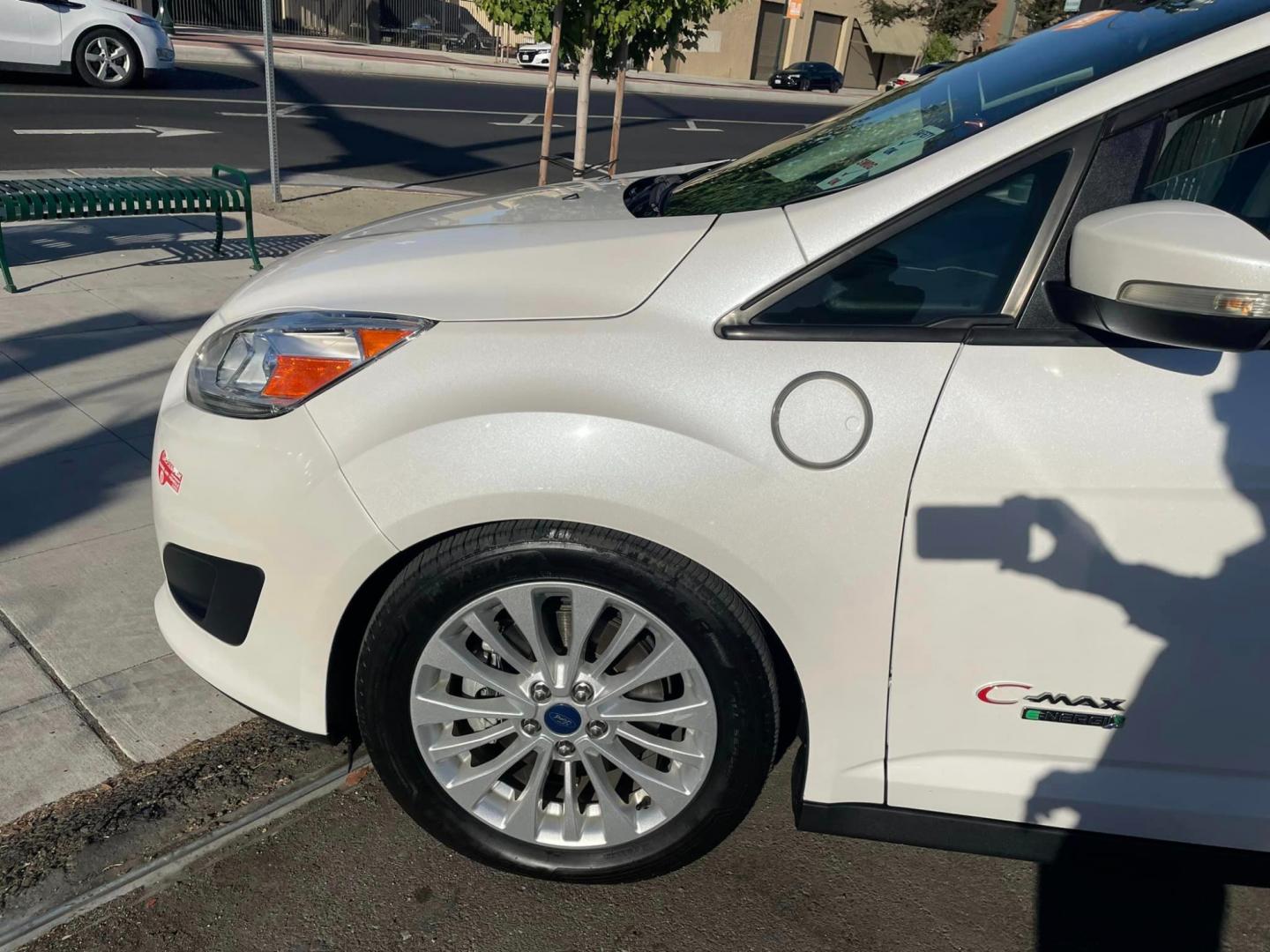 2017 WHITE Ford C-Max Energi SE (1FADP5EU7HL) with an 2.0L L4 DOHC 16V HYBRID engine, CVT transmission, located at 744 E Miner Ave, Stockton, CA, 95202, (209) 944-5770, 37.956863, -121.282082 - Photo#4