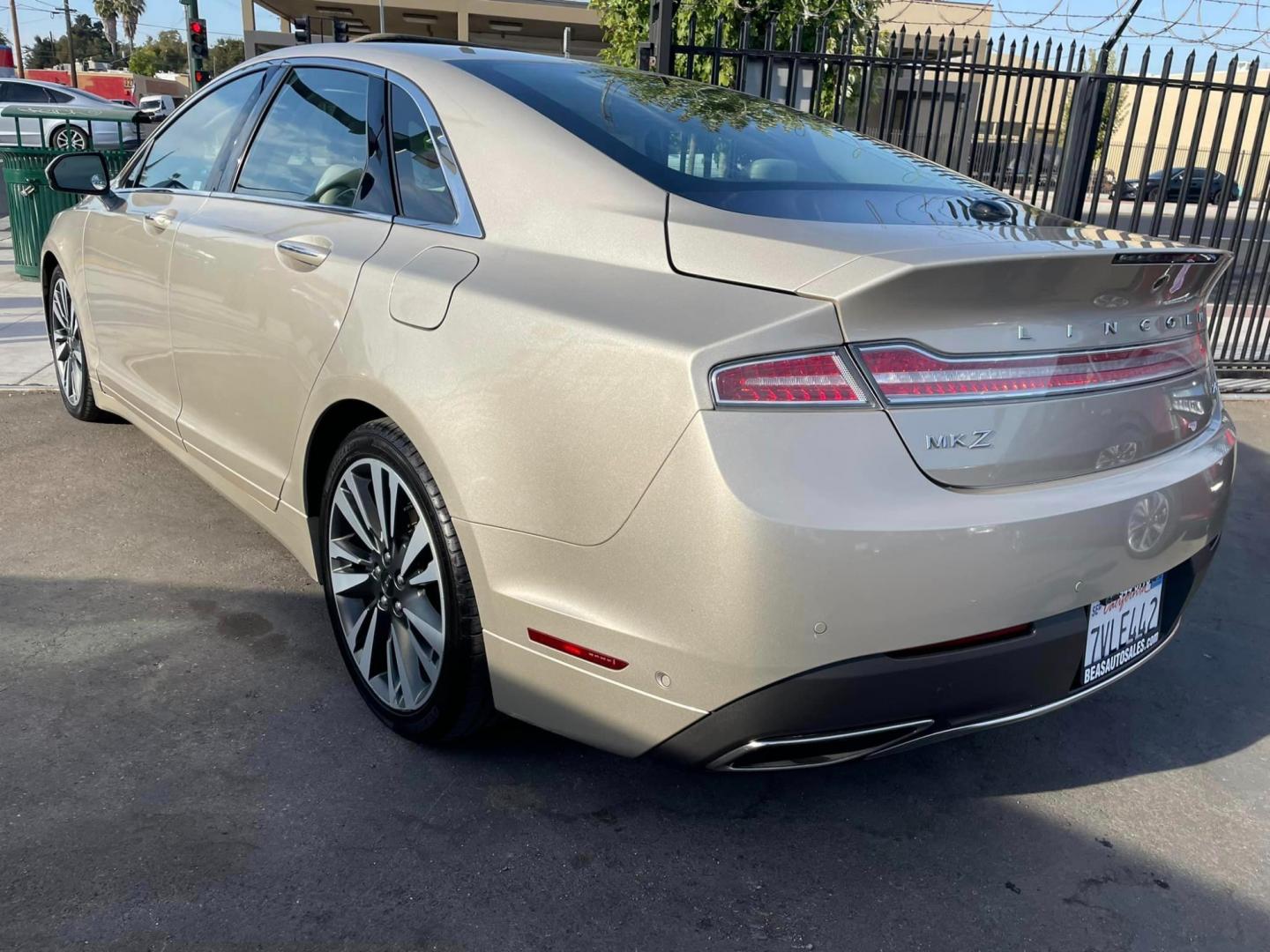 2017 White Gold /White Gold Lincoln MKZ Hybrid Reserve (3LN6L5MUXHR) with an 2.0L L4 DOHC 16V HYBRID engine, CVT transmission, located at 744 E Miner Ave, Stockton, CA, 95202, (209) 944-5770, 37.956863, -121.282082 - Photo#10