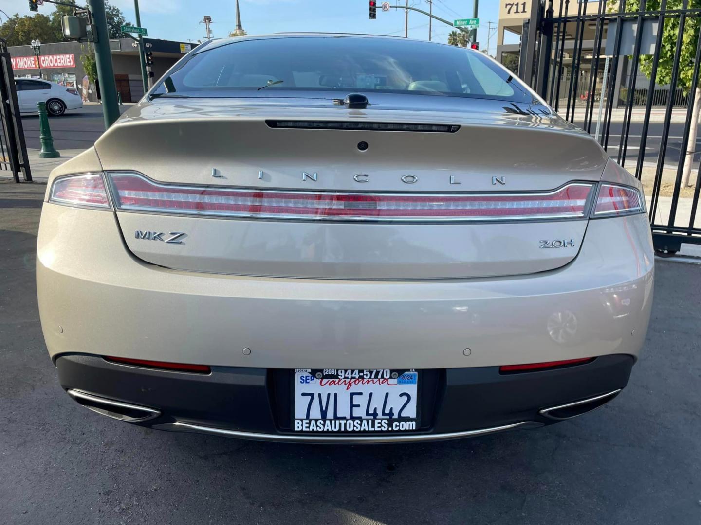 2017 White Gold /White Gold Lincoln MKZ Hybrid Reserve (3LN6L5MUXHR) with an 2.0L L4 DOHC 16V HYBRID engine, CVT transmission, located at 744 E Miner Ave, Stockton, CA, 95202, (209) 944-5770, 37.956863, -121.282082 - Photo#11