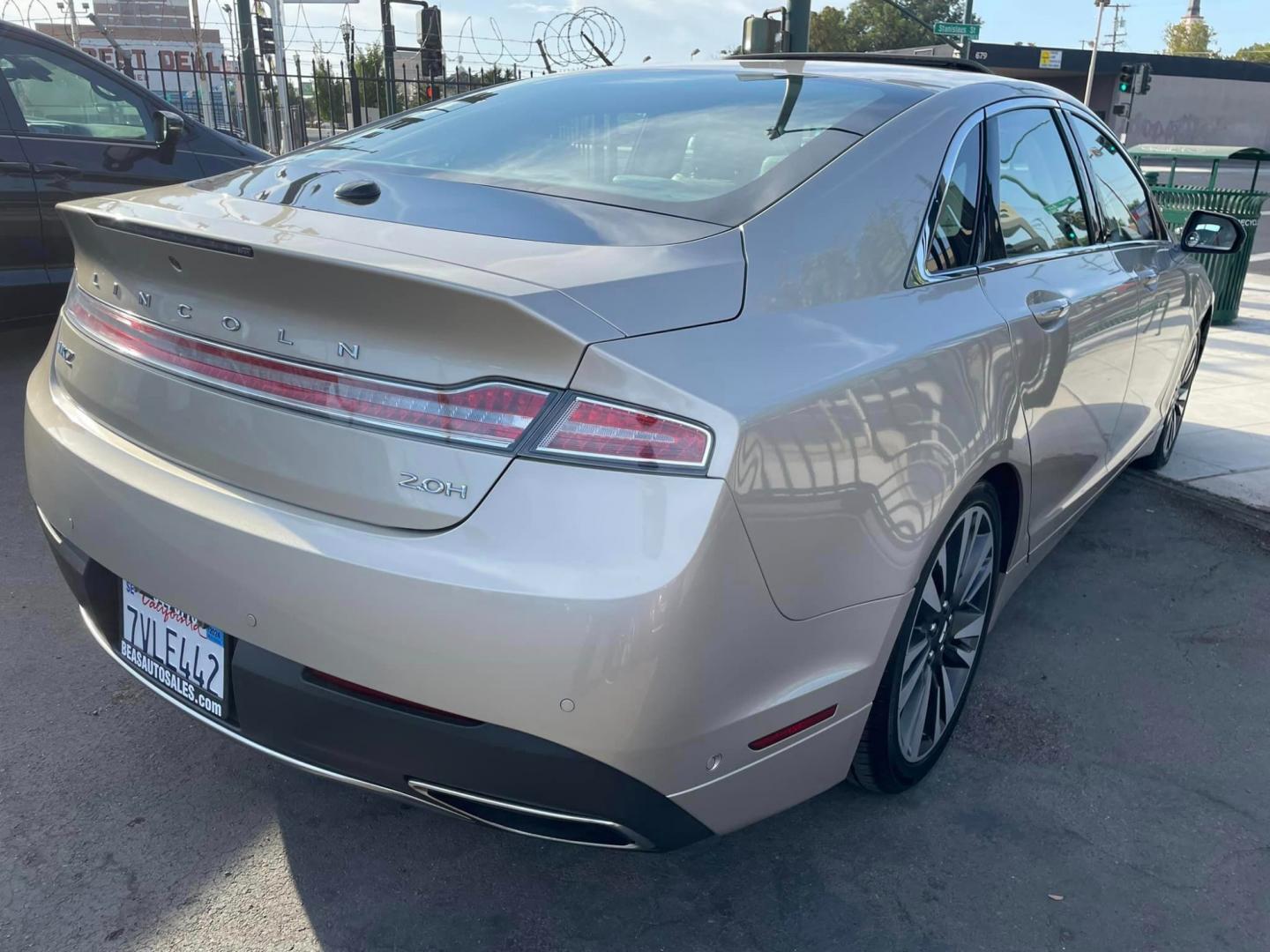 2017 White Gold /White Gold Lincoln MKZ Hybrid Reserve (3LN6L5MUXHR) with an 2.0L L4 DOHC 16V HYBRID engine, CVT transmission, located at 744 E Miner Ave, Stockton, CA, 95202, (209) 944-5770, 37.956863, -121.282082 - Photo#12