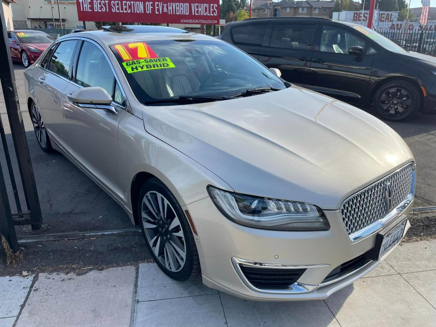 2017 White Gold /White Gold Lincoln MKZ Hybrid Reserve (3LN6L5MUXHR) with an 2.0L L4 DOHC 16V HYBRID engine, CVT transmission, located at 744 E Miner Ave, Stockton, CA, 95202, (209) 944-5770, 37.956863, -121.282082 - Photo#1