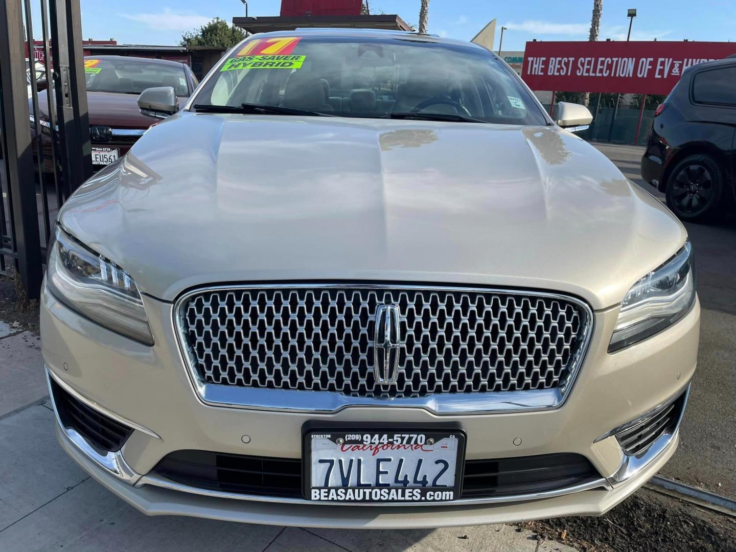 2017 White Gold /White Gold Lincoln MKZ Hybrid Reserve (3LN6L5MUXHR) with an 2.0L L4 DOHC 16V HYBRID engine, CVT transmission, located at 744 E Miner Ave, Stockton, CA, 95202, (209) 944-5770, 37.956863, -121.282082 - Photo#2