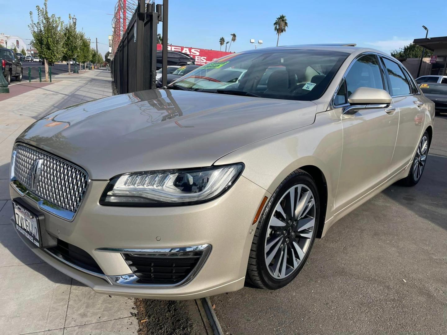 2017 White Gold /White Gold Lincoln MKZ Hybrid Reserve (3LN6L5MUXHR) with an 2.0L L4 DOHC 16V HYBRID engine, CVT transmission, located at 744 E Miner Ave, Stockton, CA, 95202, (209) 944-5770, 37.956863, -121.282082 - Photo#3