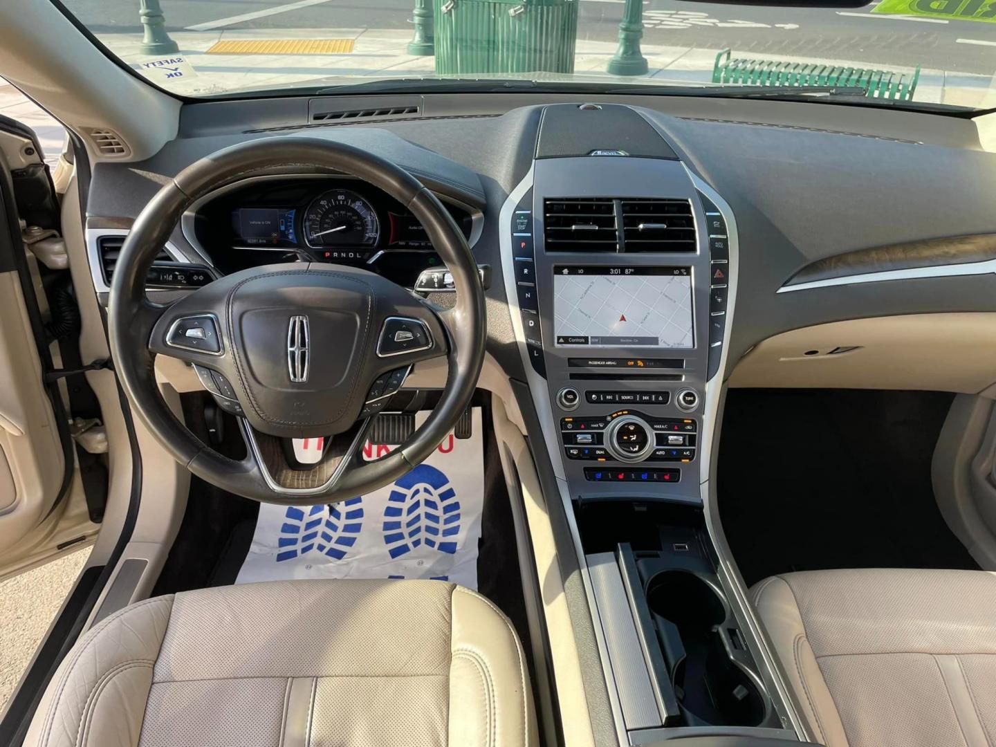 2017 White Gold /White Gold Lincoln MKZ Hybrid Reserve (3LN6L5MUXHR) with an 2.0L L4 DOHC 16V HYBRID engine, CVT transmission, located at 744 E Miner Ave, Stockton, CA, 95202, (209) 944-5770, 37.956863, -121.282082 - Photo#7