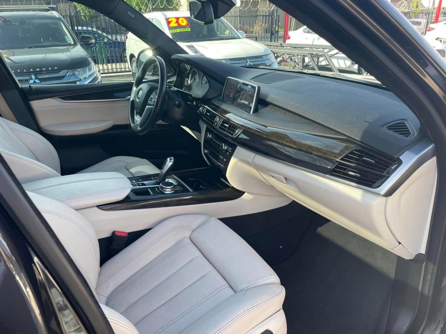 2018 DARK GRAY /White Gold BMW X5 eDrive (5UXKT0C5XJ0) with an 2.0L L4 DOHC 16V HYBRID engine, 8A transmission, located at 744 E Miner Ave, Stockton, CA, 95202, (209) 944-5770, 37.956863, -121.282082 - PLUS TAXES AND FEES - Photo#13