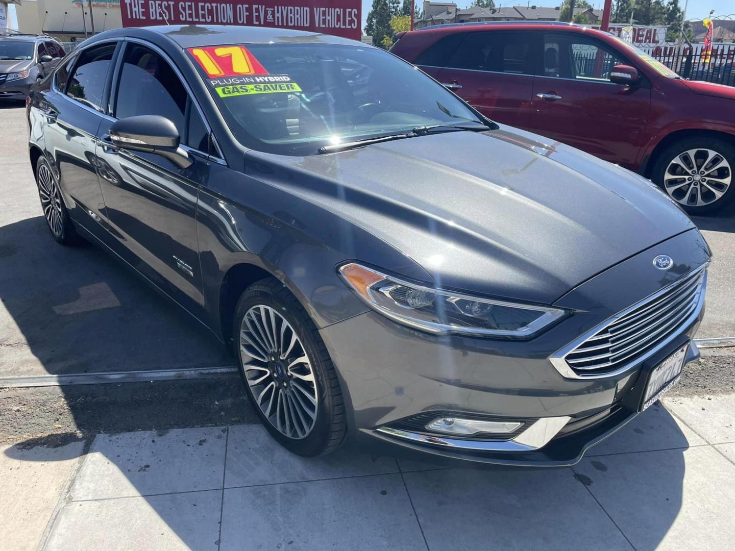 2017 Ford Fusion Energi SE (3FA6P0PU6HR) with an 2.0L L4 DOHC 16V HYBRID engine, CVT transmission, located at 744 E Miner Ave, Stockton, CA, 95202, (209) 944-5770, 37.956863, -121.282082 - PLUS TAXES AND FEES - Photo#0