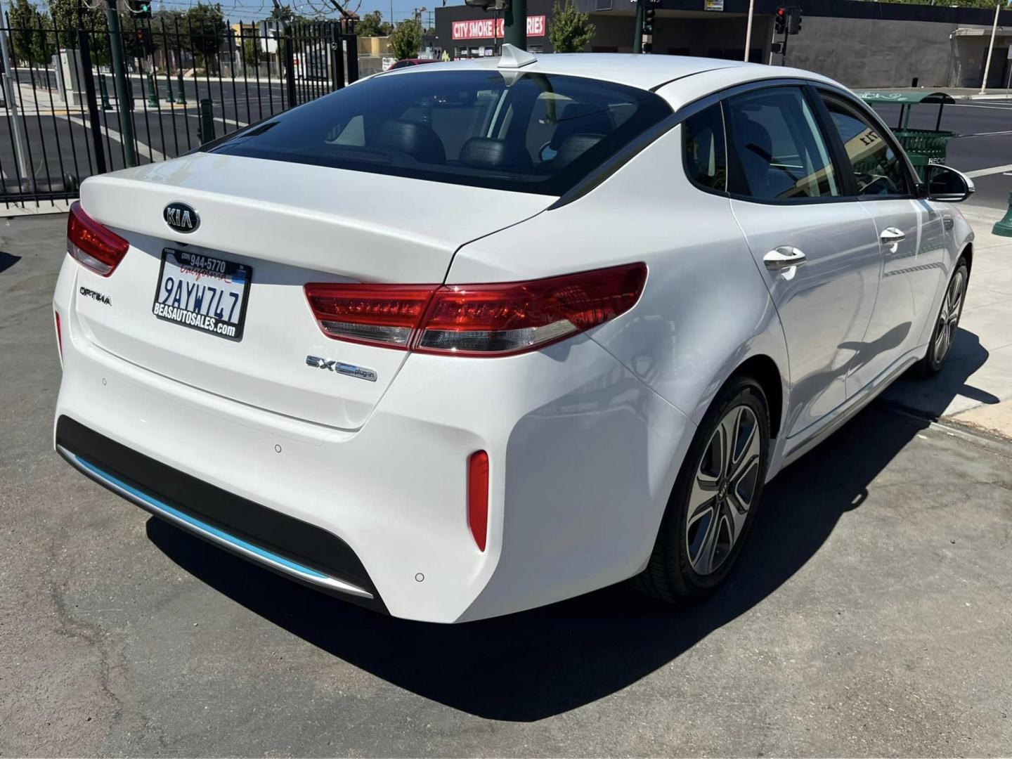 2019 Kia Optima Hybrid Plug-in EX (KNAGV4LD6K5) with an 2.0L L4 DOHC 16V HYBRID engine, 6A transmission, located at 744 E Miner Ave, Stockton, CA, 95202, (209) 944-5770, 37.956863, -121.282082 - PLUS TAXES AND FEES - Photo#11