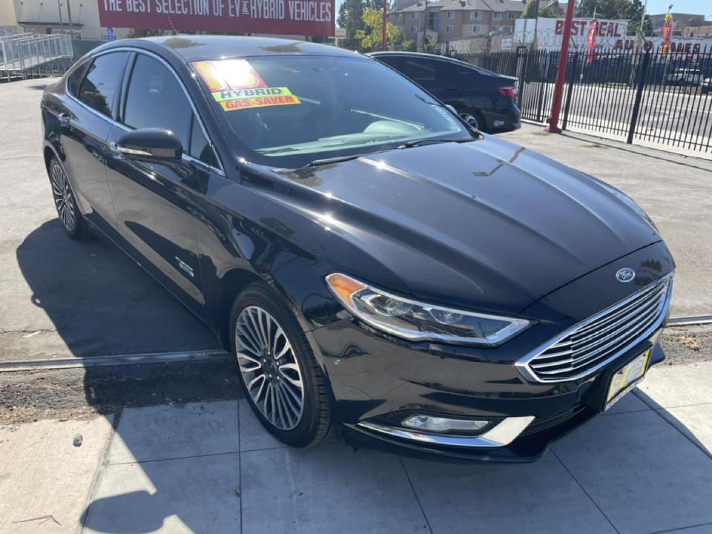 2018 BLACK /BLACK Ford Fusion Energi Titanium (3FA6P0SU1JR) with an 2.0L L4 DOHC 16V HYBRID engine, CVT transmission, located at 744 E Miner Ave, Stockton, CA, 95202, (209) 944-5770, 37.956863, -121.282082 - PPLUS TAXES AND FEES - Photo#1