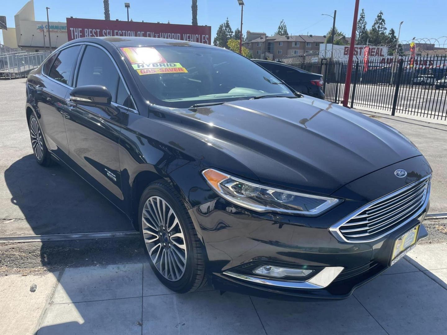 2018 BLACK /BLACK Ford Fusion Energi Titanium (3FA6P0SU1JR) with an 2.0L L4 DOHC 16V HYBRID engine, CVT transmission, located at 744 E Miner Ave, Stockton, CA, 95202, (209) 944-5770, 37.956863, -121.282082 - PPLUS TAXES AND FEES - Photo#0