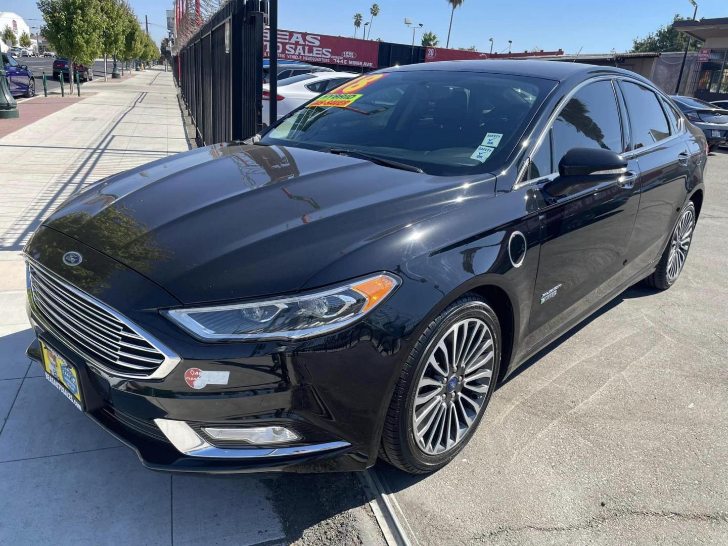 2018 BLACK /BLACK Ford Fusion Energi Titanium (3FA6P0SU1JR) with an 2.0L L4 DOHC 16V HYBRID engine, CVT transmission, located at 744 E Miner Ave, Stockton, CA, 95202, (209) 944-5770, 37.956863, -121.282082 - PPLUS TAXES AND FEES - Photo#3