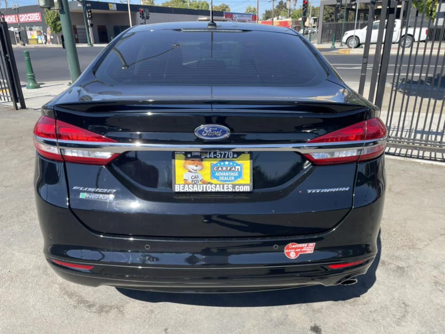 2018 BLACK /BLACK Ford Fusion Energi Titanium (3FA6P0SU1JR) with an 2.0L L4 DOHC 16V HYBRID engine, CVT transmission, located at 744 E Miner Ave, Stockton, CA, 95202, (209) 944-5770, 37.956863, -121.282082 - PPLUS TAXES AND FEES - Photo#14