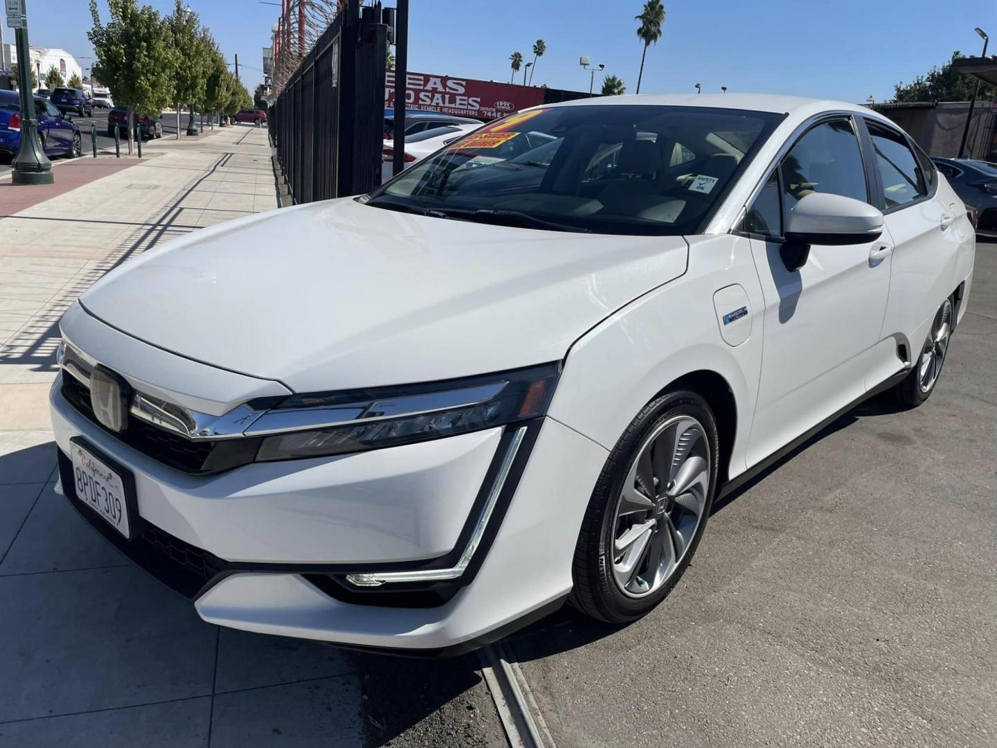 2019 WHITE Honda Clarity Touring Plug-In Hybrid (JHMZC5F37KC) with an 1.5L L4 DOHC 16V HYBRID engine, CVT transmission, located at 744 E Miner Ave, Stockton, CA, 95202, (209) 944-5770, 37.956863, -121.282082 - PLUS TAXES AND FEES - Photo#2